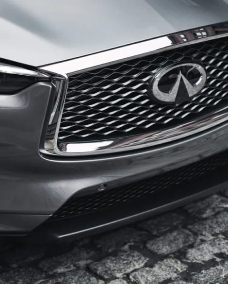 Front exterior close up of 2024 INFINITI QX50 double-arch grille