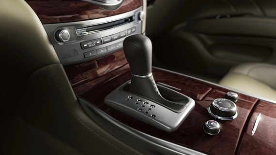 Interior View Of 2019 INFINITI Q70L Sedan's Center Console And Shifter Highlighting Drive Mode Selector